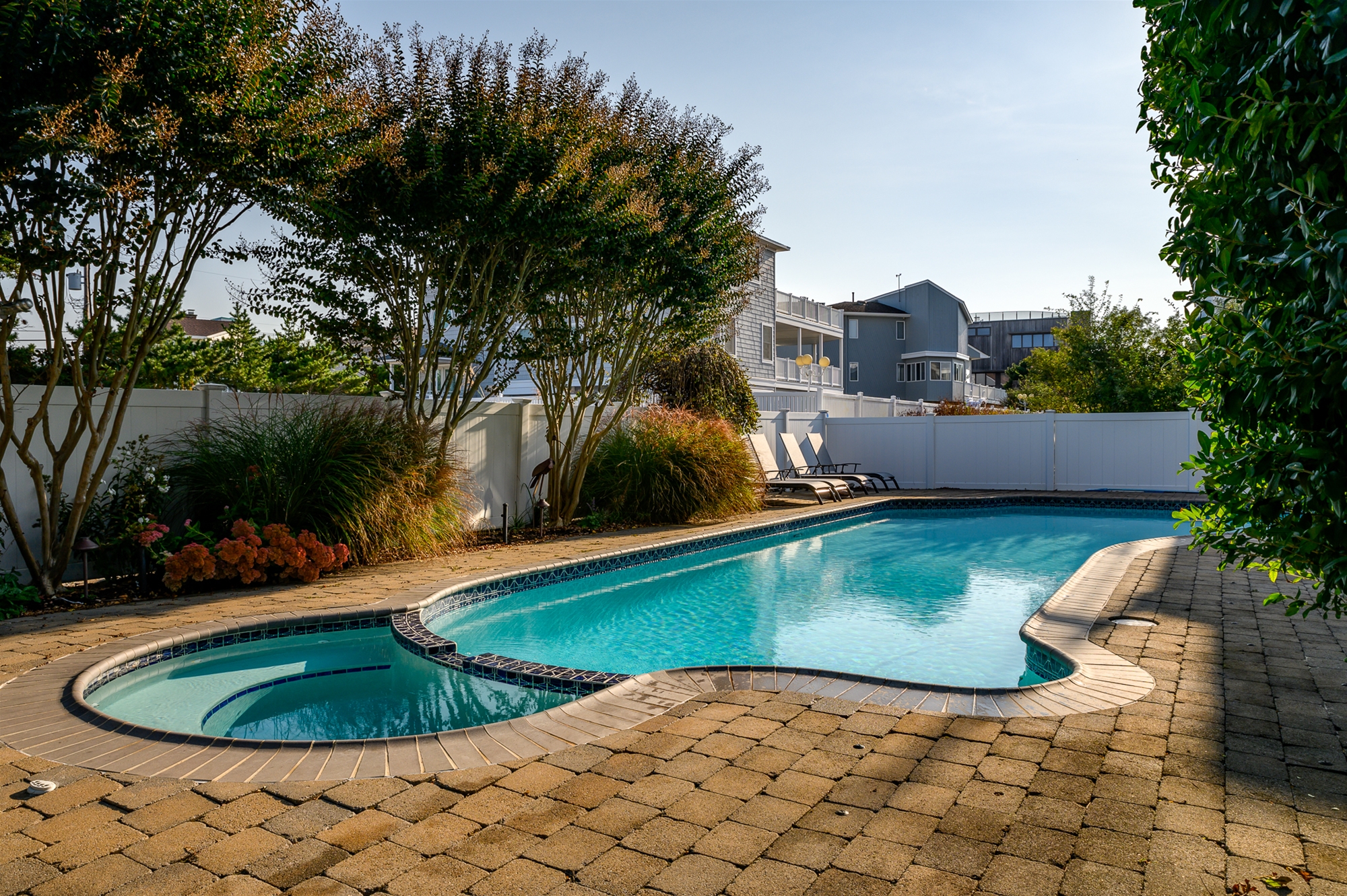 Pool and Hot Tub with paver patio