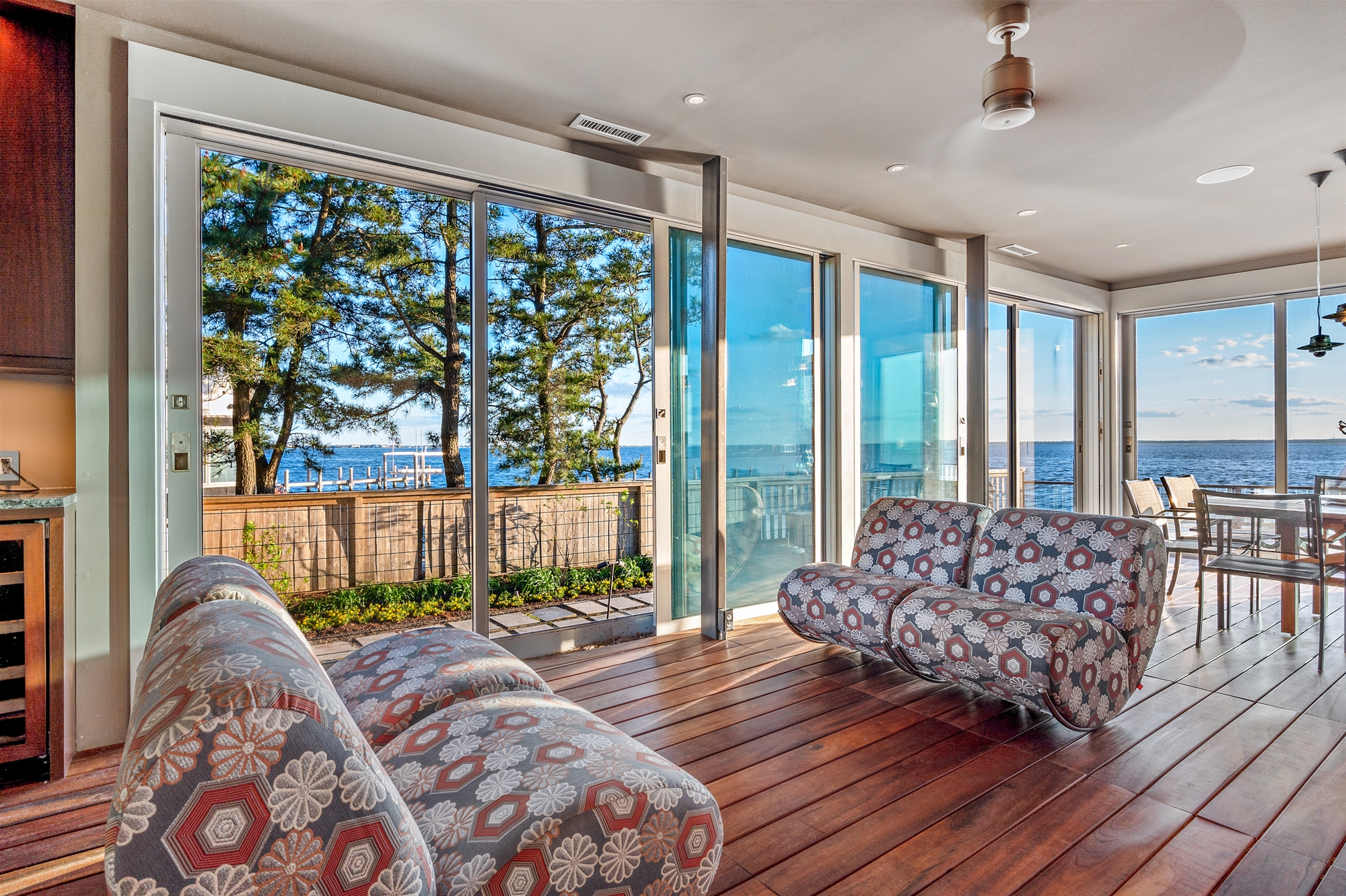 Sunroom Theatre with wet bar, gathering table and fireplace