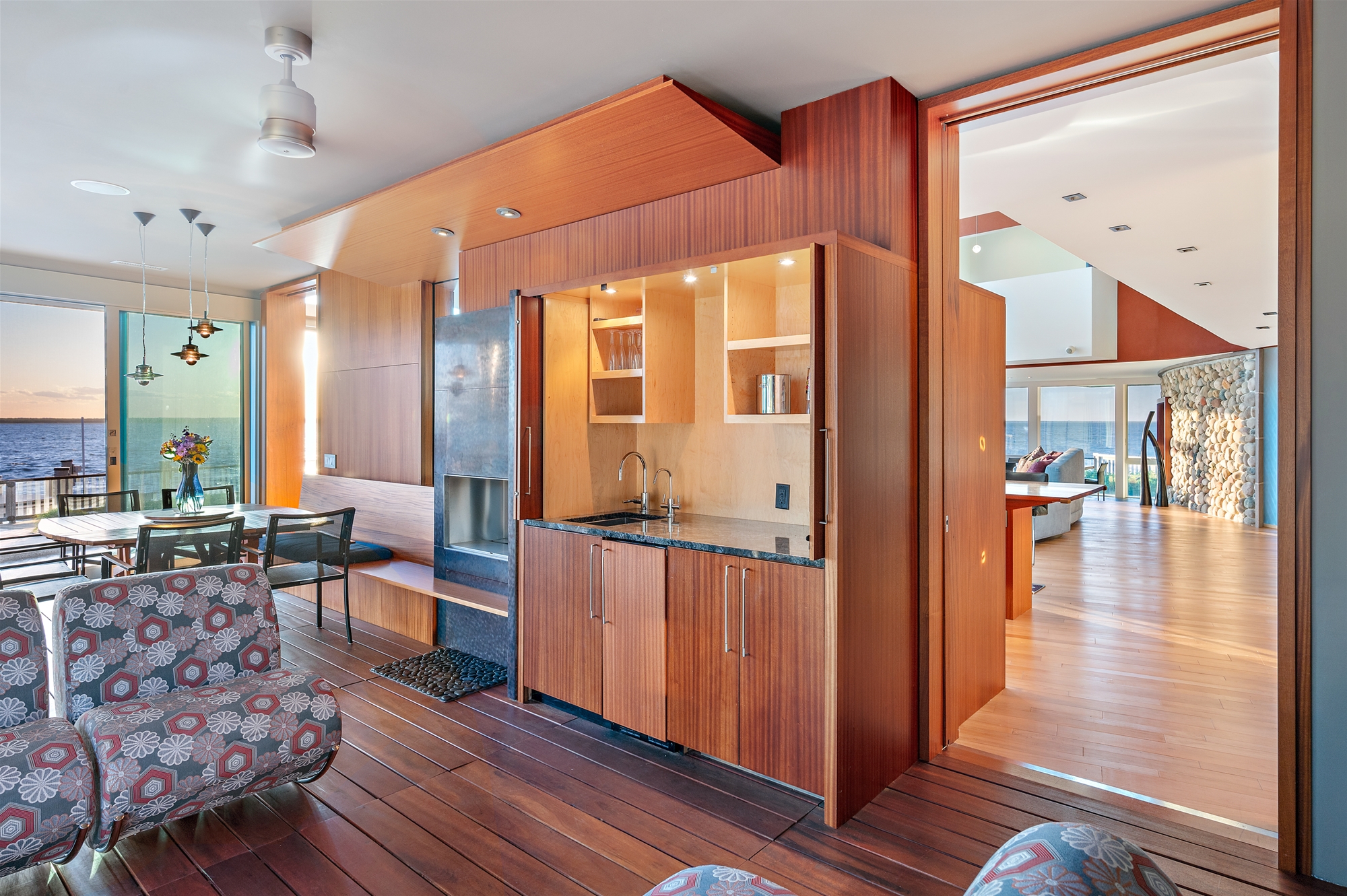 Wet bar in Sunroom leading into Living Space